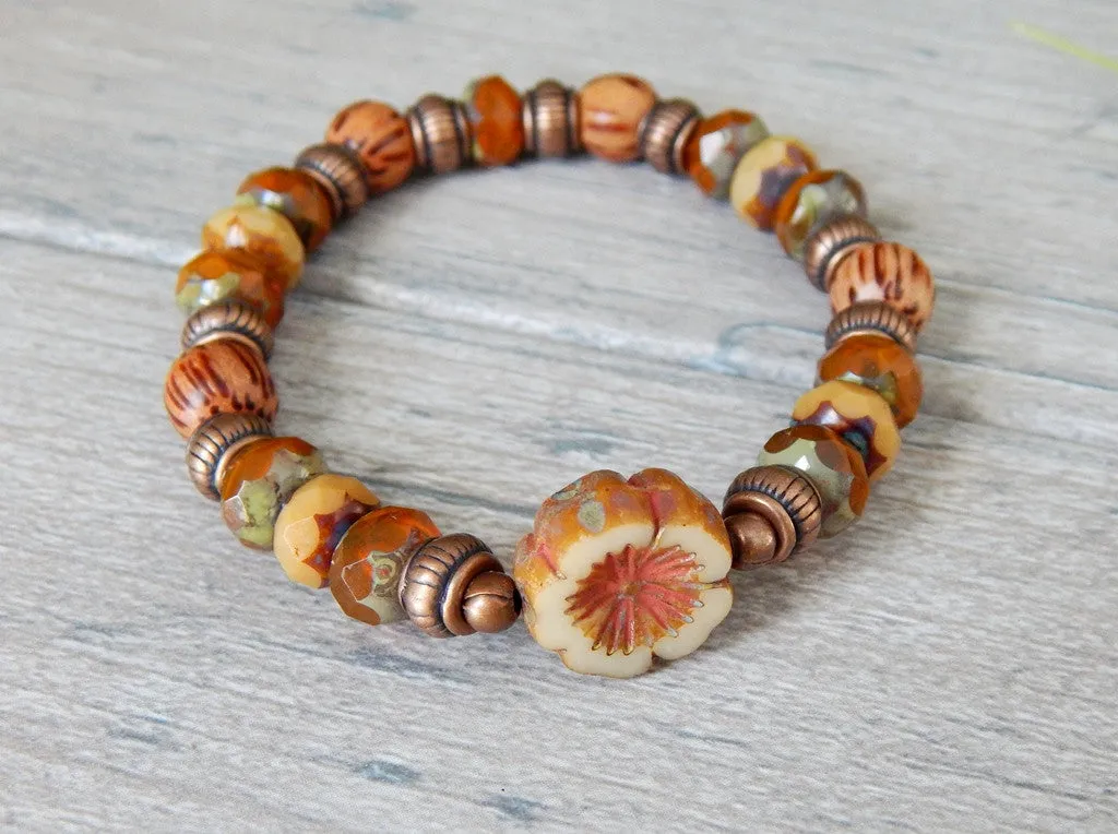 Rustic Orange Beaded Bracelet with Flower focal bead