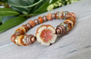 Rustic Orange Beaded Bracelet with Flower focal bead