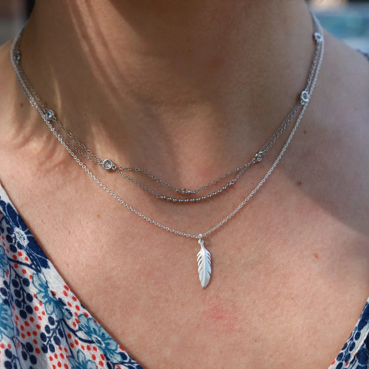 Tiny Feather Necklace - Brushed Sterling Silver